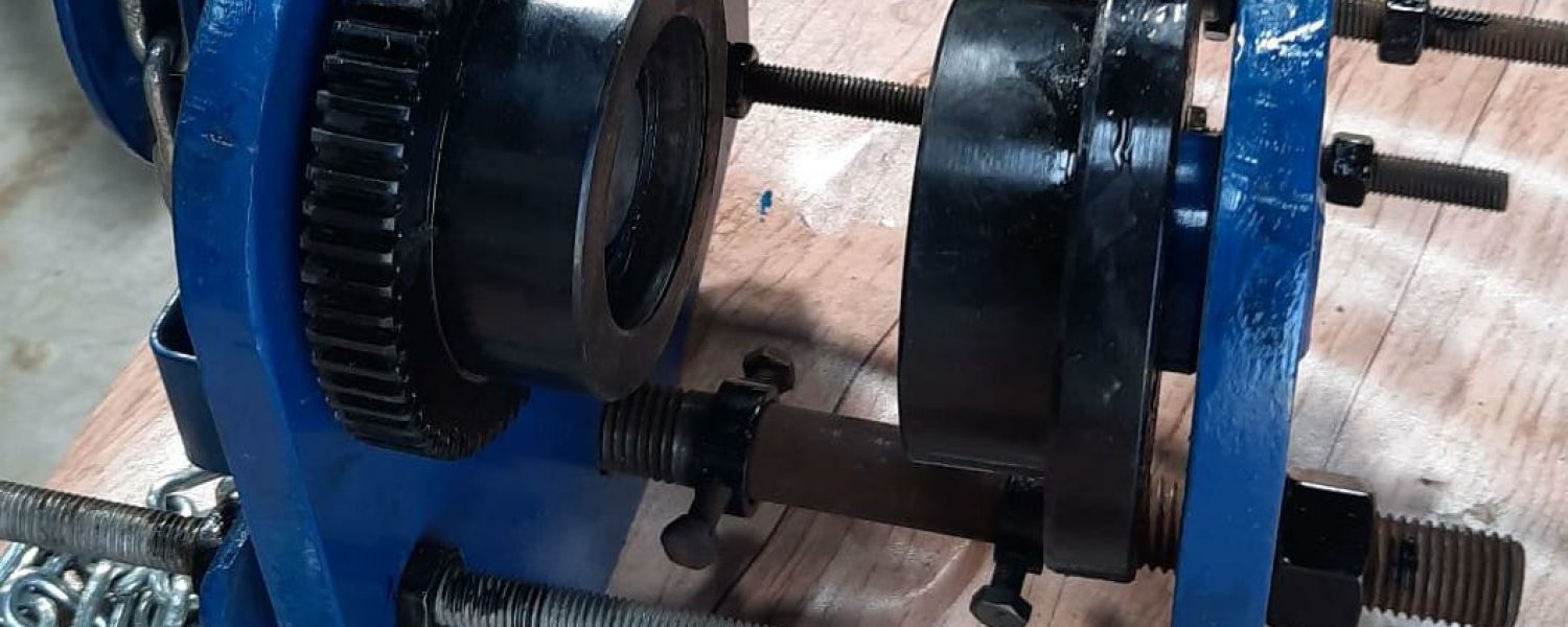 Chain Hoist Trolley Reverse Engineering A chain hoist trolley machine assembled with gears, bearings, and steel plates